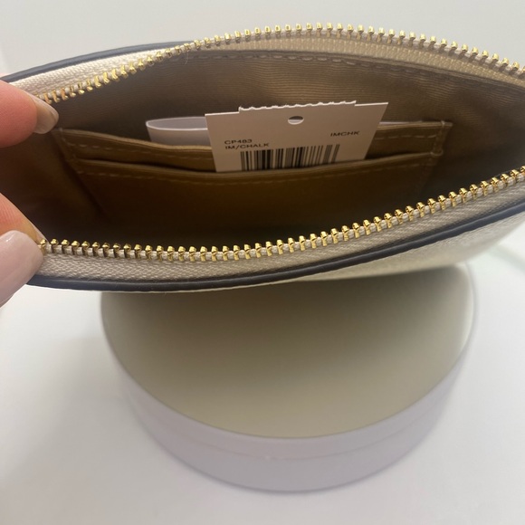 Coach Cream Leather Clutch with Zipper Closure